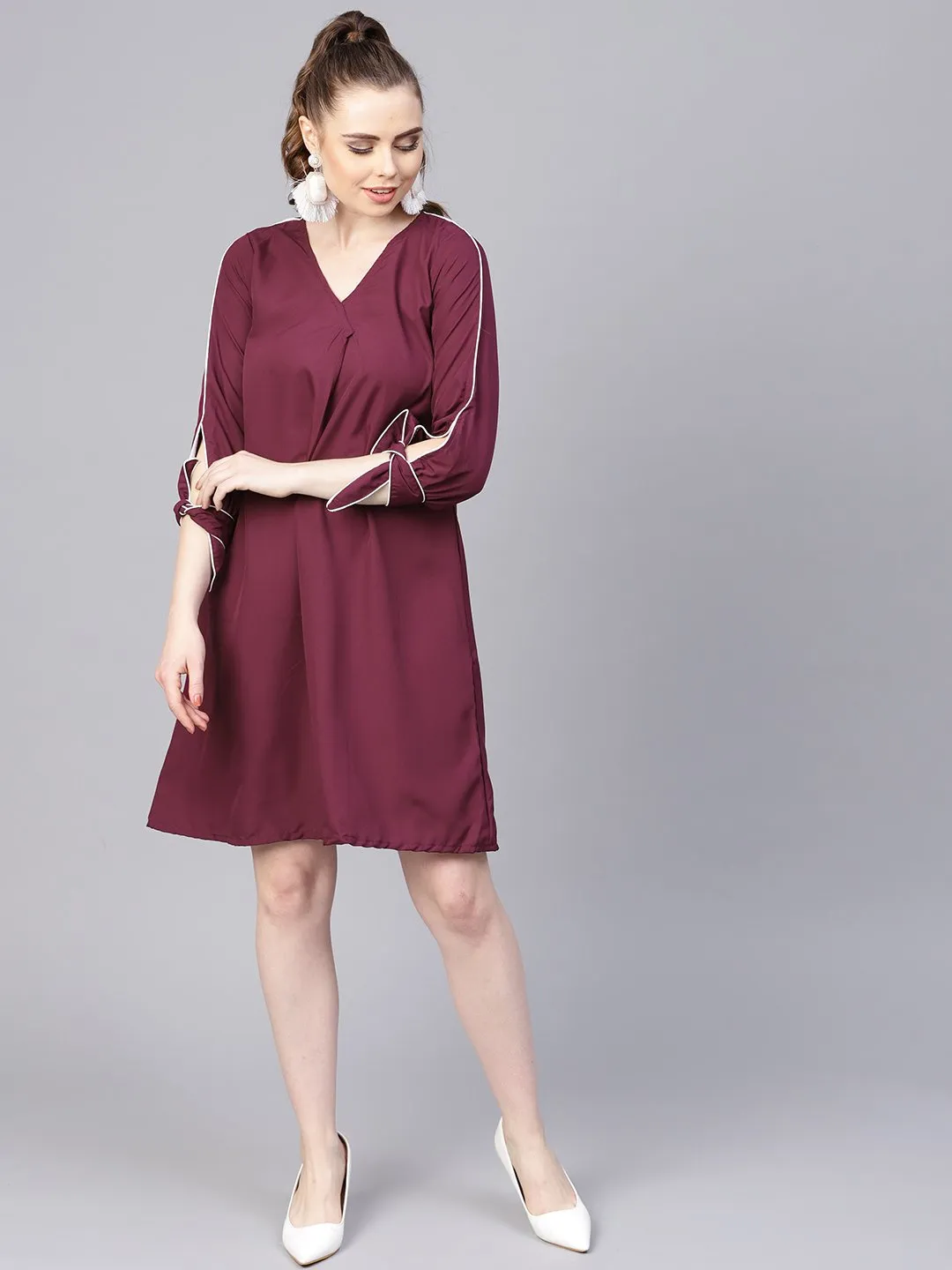 Burgundy A-line dress with knot style sleeves