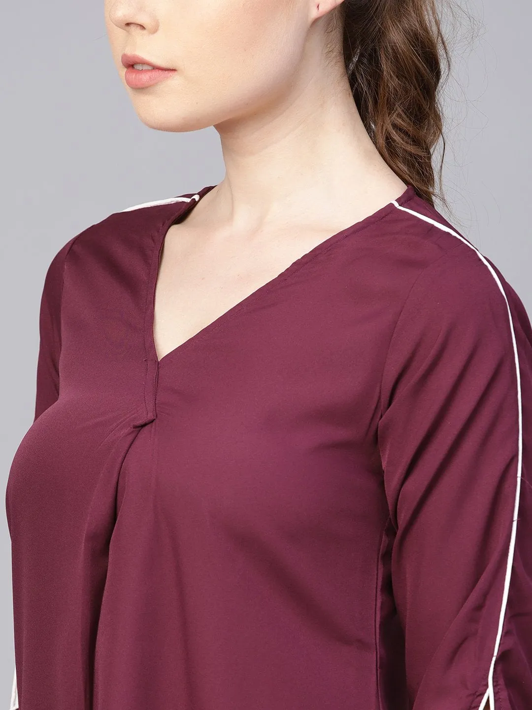 Burgundy A-line dress with knot style sleeves